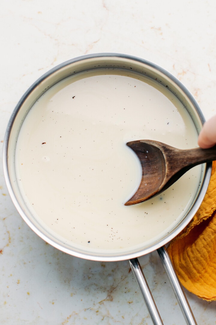 Rice and milk in a saucepan.