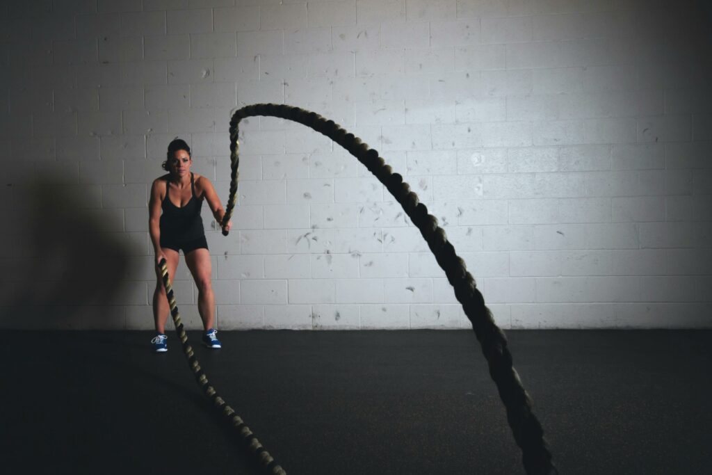woman-working-out-with-battle-ropes